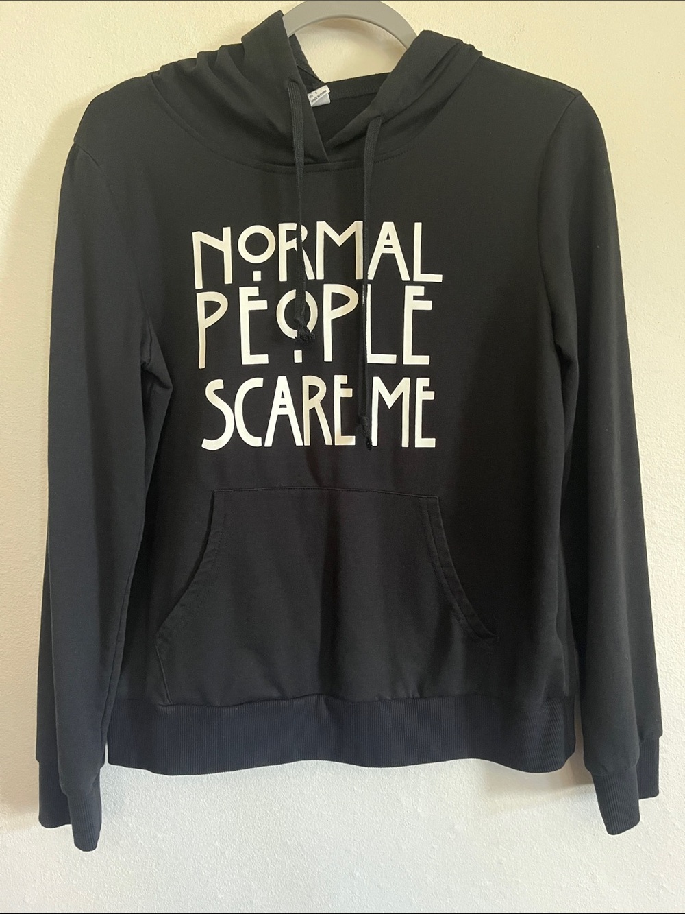 Source Unknown Black Hoodie Sweater with White Slogan